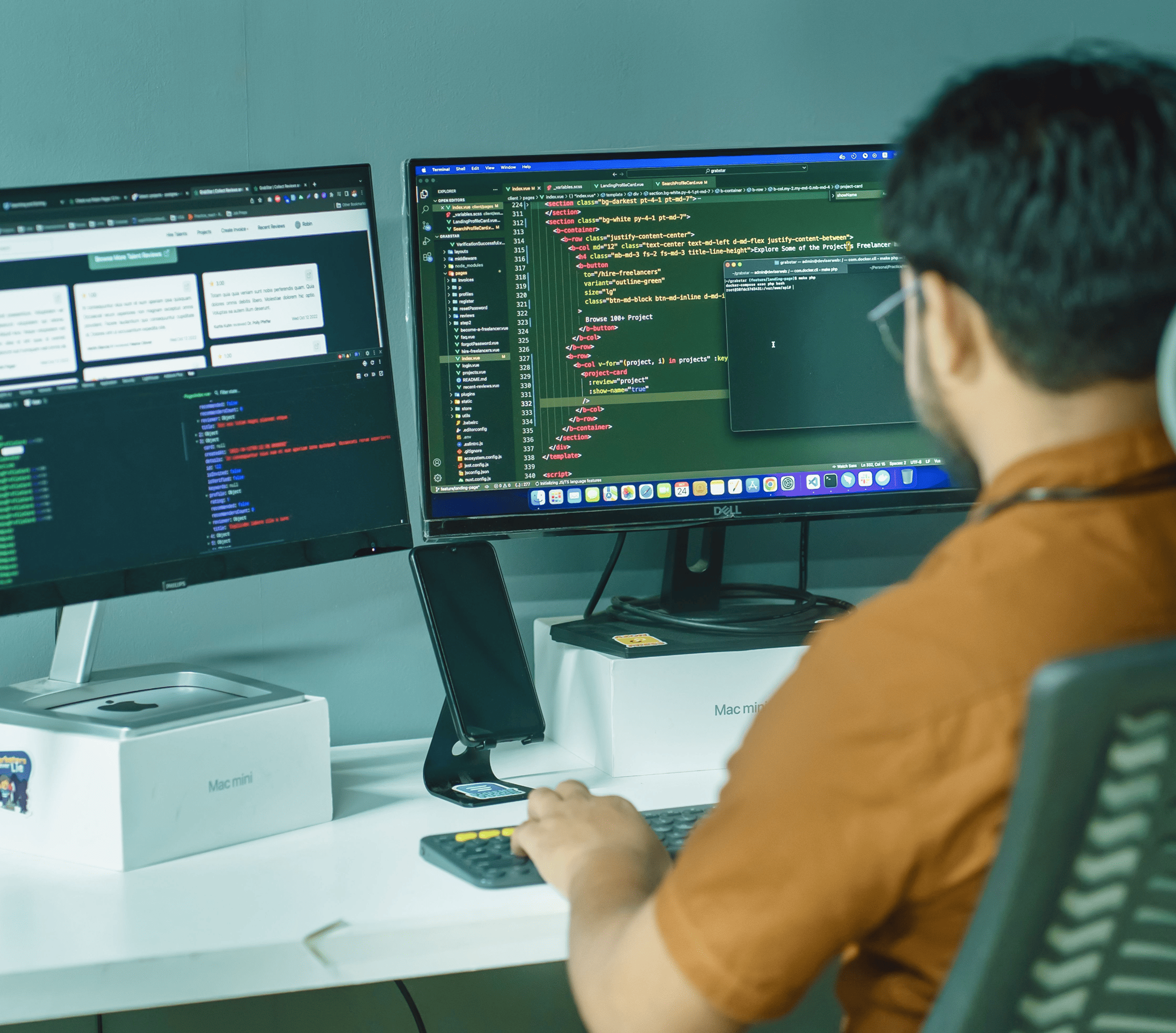 Developer working at computer screens